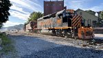 WE 7002 & Co. push hard up the hill toward the CSX.